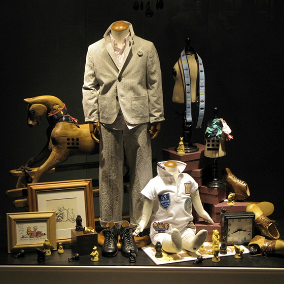 Window Display boys with a wood horse